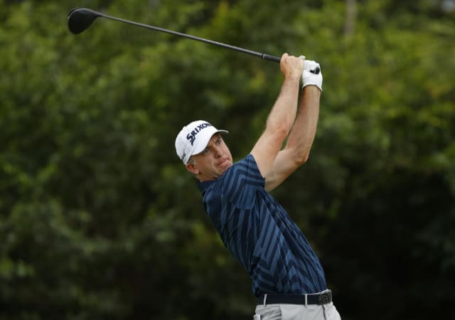 Martin Laird on the golf course accomplishing a golf swing
