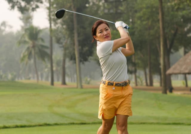 A golfer just after performing a swing