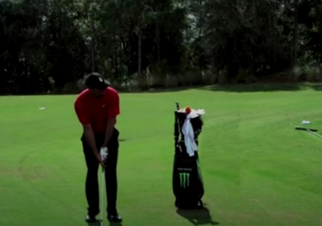 tigerwoods demonstrating pitching