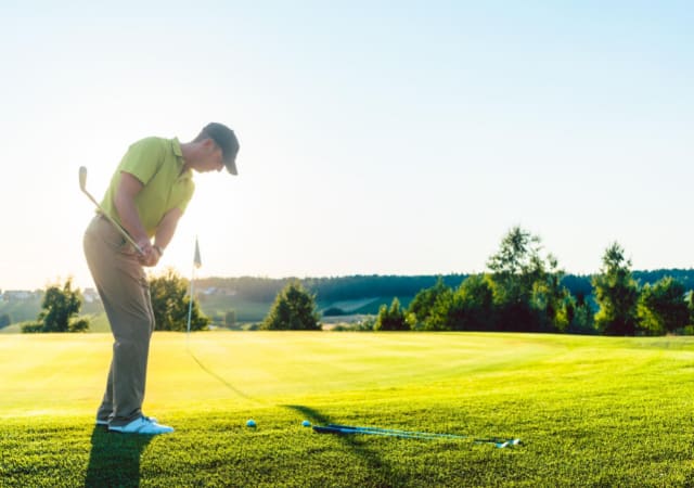 golfer hitting the ball
