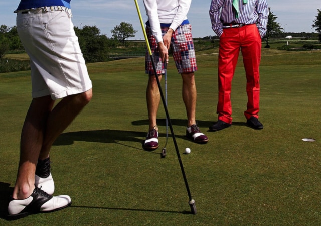 golfer hitting the golf ball