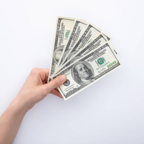 holding dollars